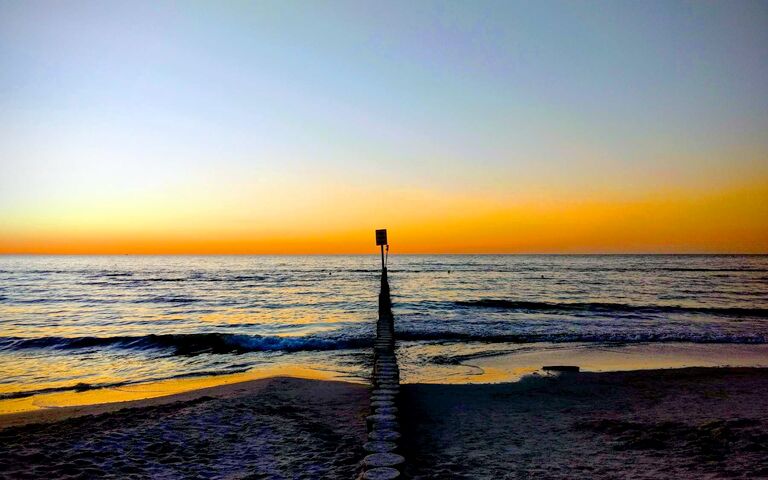 Strand im Sonnenuntergang in Kolberg